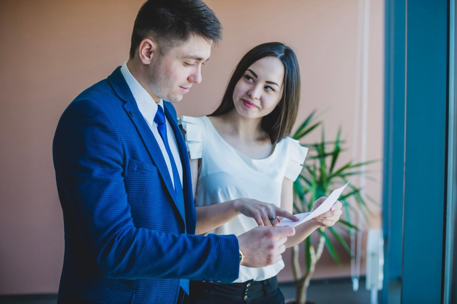 Professional trading setup with multiple monitors displaying technical analysis charts